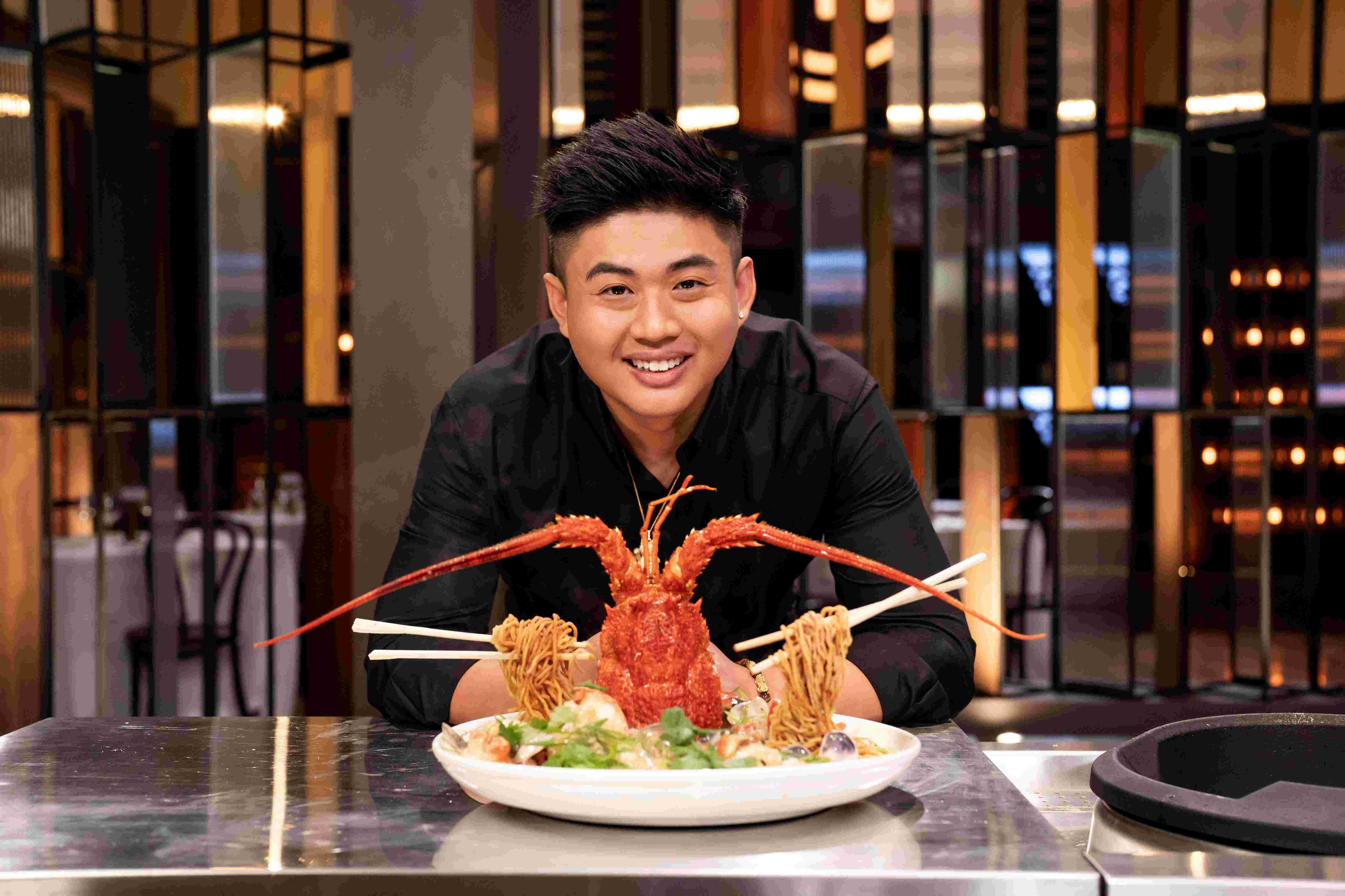 Vincent Lim posing with his Flying Noodles dish